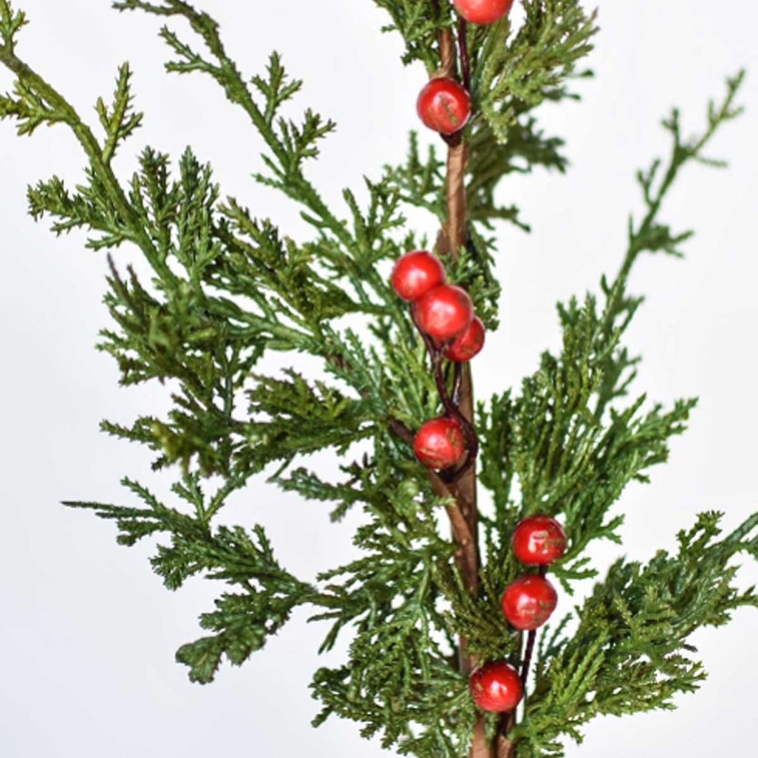 Faux holiday stems and greenery