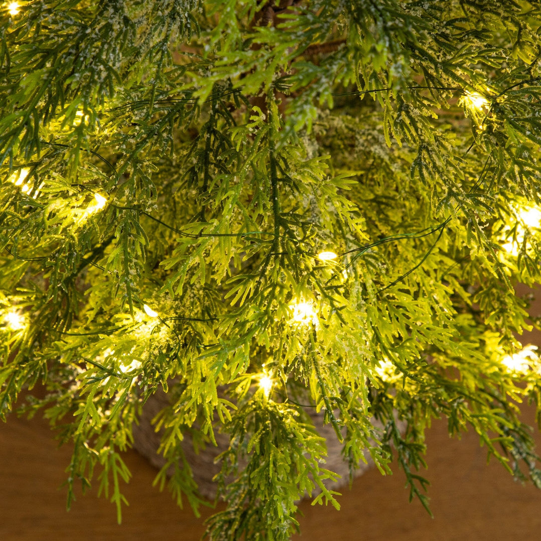 4’ Pre-Lit Artificial Snowed Cypress Christmas Tree with 120 LED Lights in Hyacinth Basket